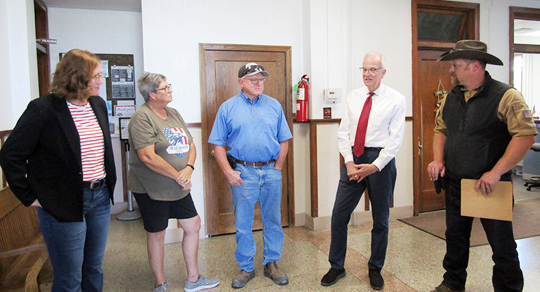Below (L-R): Simone Elder, Executive Director of the Kansas Sampler Foundation; Pam and Tracy Rickford; Senator Moran; Kris Casper, Wichita County Sheriff.