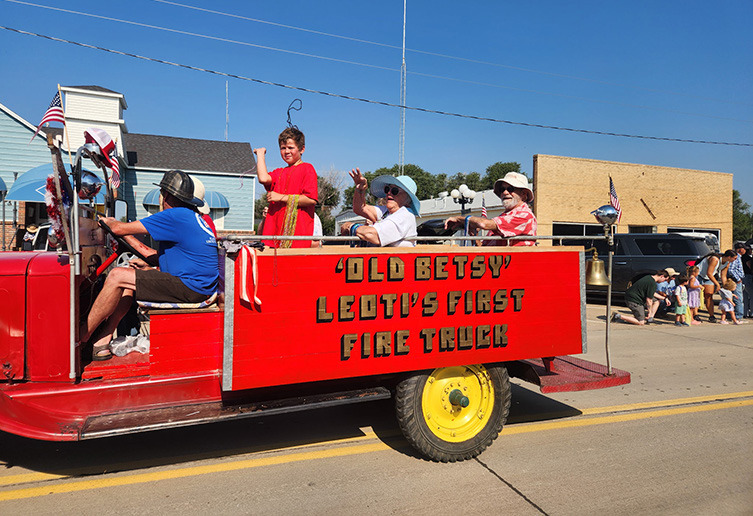 ‘Old Betsy’ makes her annual appearance at the Parade, with members of the Wichita County Historical Society aboard. Photo by Rita Smith