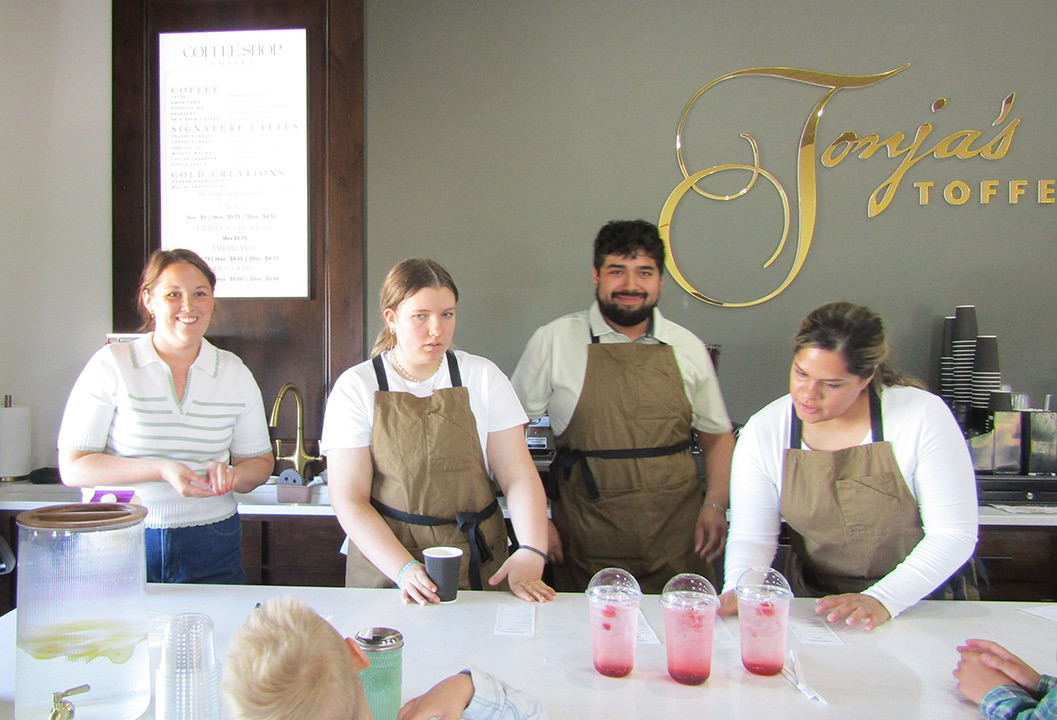 Above (L-R): Aubrey Horton, Hayden Horton, Victor Martinez, Krystal Bontrager work the order counter on opening day.
