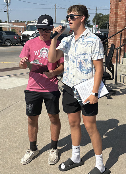Volunteers Tyson Peters and Gannon West put the new Main Street Sounds system to work announcing the parade