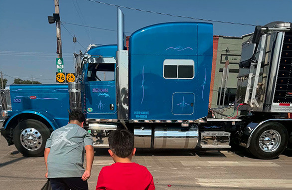 Darren Crouch of Sedona Trucking prepares to pull through the 4-way during the Wichita County Fair Parade.