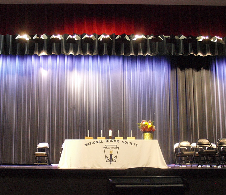The stage is set to induct new members.