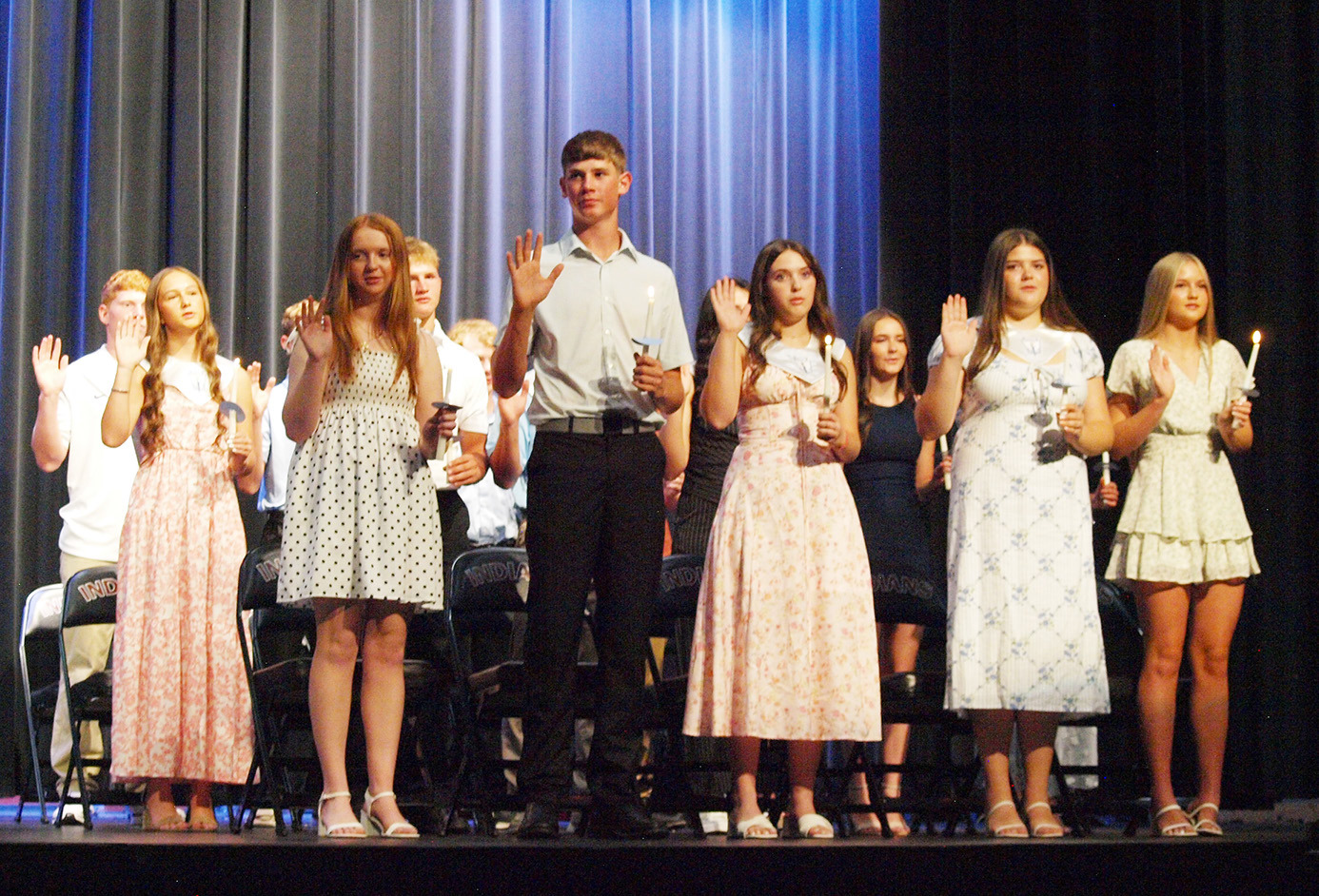 Mrs. Brown handed out New NHS members make their Pledge. memberships. Superintendent Brant Douglas was in attendance, handing out flowers.