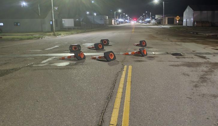 Traffic cones on 4th Street (Hwy 25) were knocked over during Saturday’s storm. Reminds your editor of the “We Shall Rebuild” patio furniture meme.
