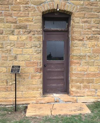 A closeup of the entrance of the Old Stone Church.