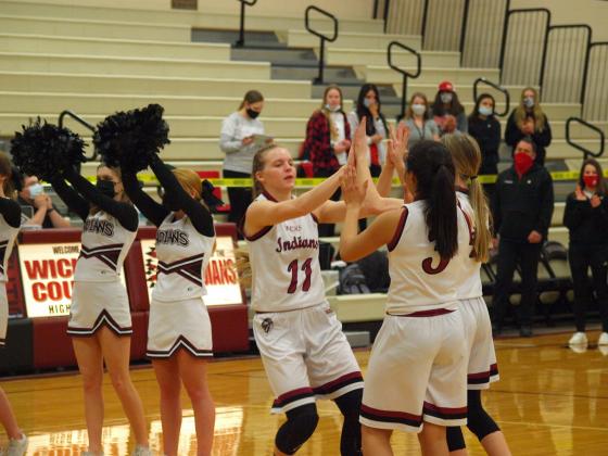 Ally Wiggs and teammates ready for the game