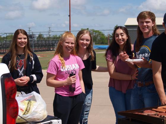 Students enjoying the tailgate party