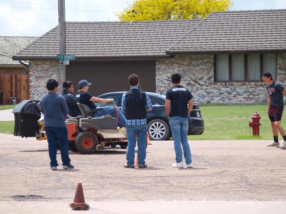 Students enjoying a little tractor driver