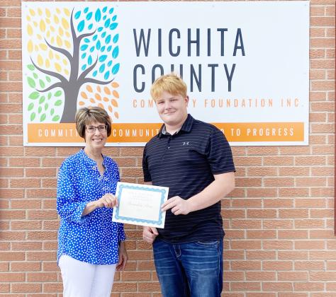 Brandon Price receives the Jim &amp;amp; Judy Biel Memorial Scholarship