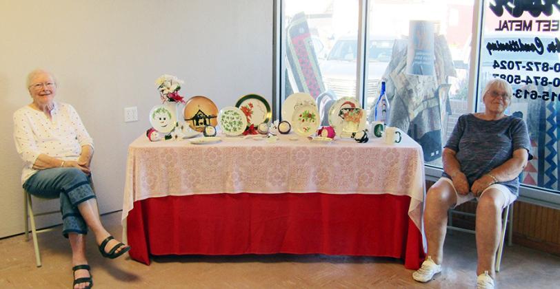 Above: Sisters Bernice Crouch and Jeanene French display Bernice's hand-painted china.