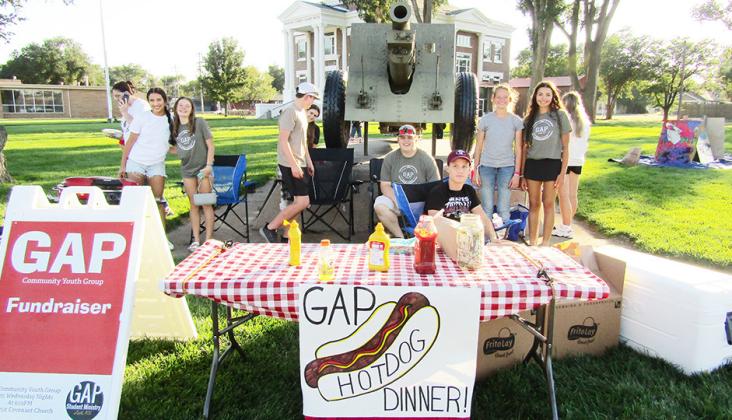 Above: GAP youth provided hotdogs with the fixins and chips to hungry walk-goers (walkers?) as a fundraiser for their youth group.