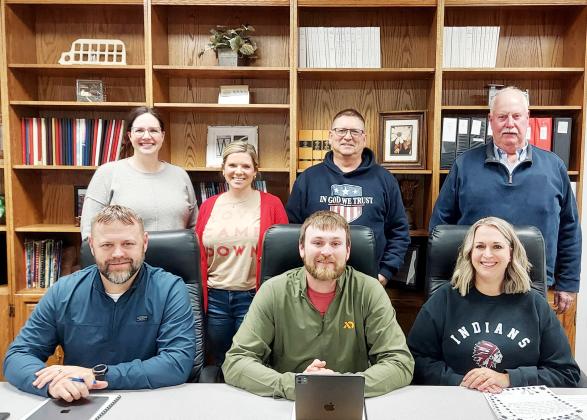 Newly-elected members of the USD 467 Board of Education joined the three incumbent members in getting to work for the district. Pictured above, back row (L-R): Maegan Berry, Eryka Smith, Bruce Loy, Farrin Watt, all new members. Front Row (L-R): Josh Young, Jesse Harbrige, Julee Beedy.