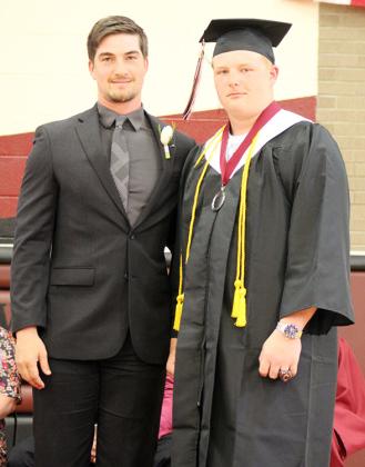 Above: WCHS Principal Brant Douglas and Class of 2024 Salutatorian Brandon Price.