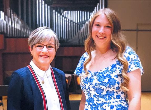 Governor Laura Kelly and WCJSHS Valedictorian Clara Koehn pose for a photo at the 42nd Annual Governor's Scholars Awards Program banquet on May 4