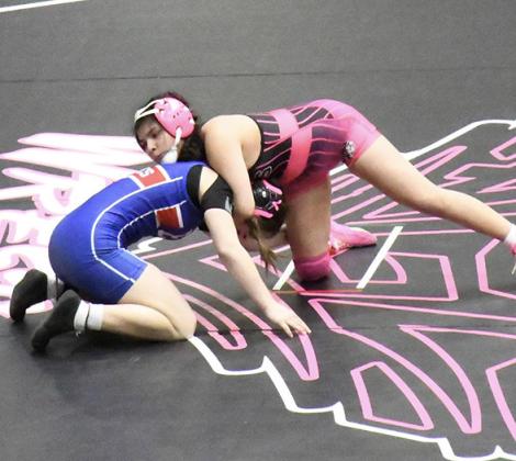 Above: Angela Barreras on her way to earning a 6th place medal.