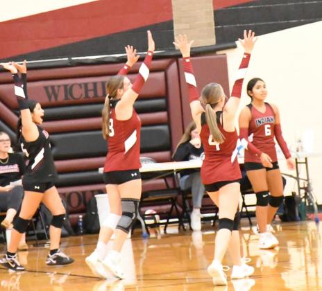 JV Celebrates the Ace. Eleny Holguin, Mya Sigila, Maddie Ames, Yackie Barrera. Photo by Misty Gardner.