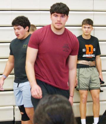 WCHS 2024 graduate Christopher Michel lends a hand.