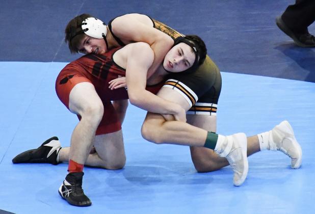 Above: Jackson Cheatum at Scott City. Photo by Misty Gardner Below: Tyson Peters at Hoisington. Photo by Matt Price