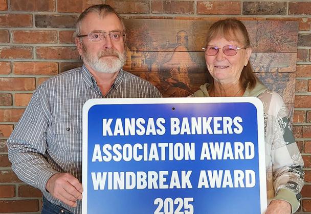 Greg and Linda See display their 2025 Kansas Bankers Association Windbreak Award. (Provided)