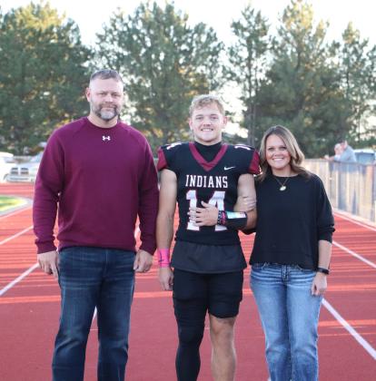 Senior Footballer Cashton Young with parents Josh and Courtney Young
