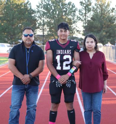 Senior Golfer Audrina Marcy with parents Steven and Brandy Marcy.