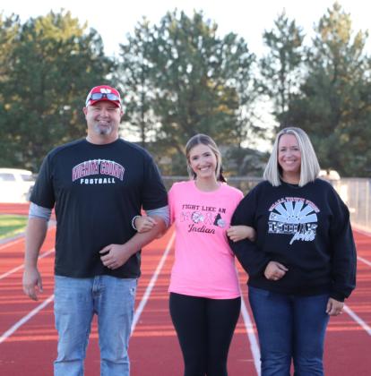 Senior Cheerleader Taylor Beedy with parents Roy and Julee Beedy