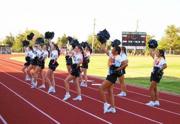 The WCHS Cheerleaders get the crowd in the spirit before the game starts. All football photos by Dave Breitkreutz, WCNS staff