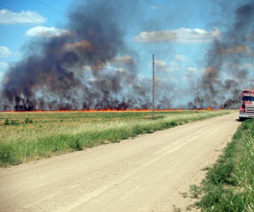 Leoti Volunteer Fire Department Battles Wheat Field Fire in South of County