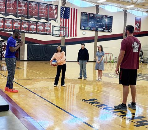 “Top Flight,” Crisianna Rodriguez, Luke Meyer, Mrs. Stacy Porter, Coach Haydon Parks - Explaining the challenge for Crisianna to complete a specific pass.