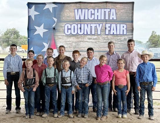 Round Robin Exhibitors – Back row: Zach Marcy, Emerson Biermann, Lyvia Imler, Faith Marcy, Audrina Marcy, Reid Marcy, Gage Kreutzer, Kade Gerstberger, Zane Gerstberger Front row: Quaid Imler, Cauy Larson, Crue Larson, Blayson Smith, Kennedy Long, Gentry Kreutzer, and Kelly Owens