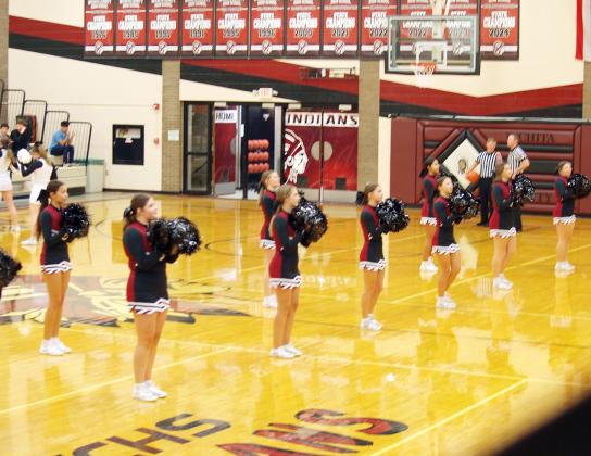 WCHS Cheer squad takes to the court to entertain the fans.