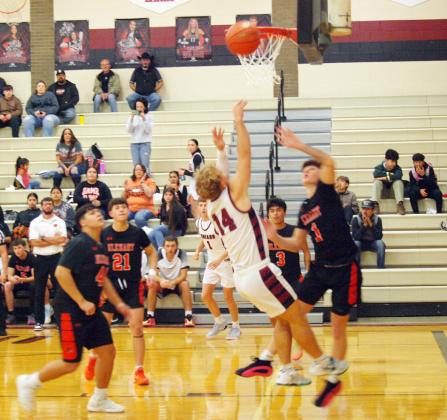 Cashton Young (14) takes his shot.