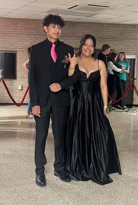 Efren Ugalde, Fr., escorts Paola Barrera, Sr photo courtesy Oralia Soto.