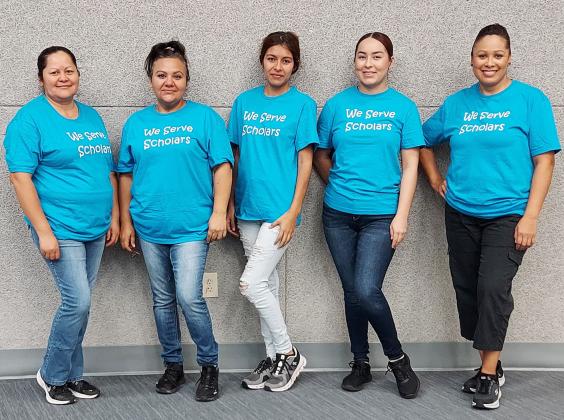 Top: This year's theme in a wall graphic. (Both) Photo credit: Tammy Mason Above: The Ladies of Lunch: Rosa Marchant, Cristina Lopez, Selena Gonzalez, Michelle Alatorre, Cristina Escalante.