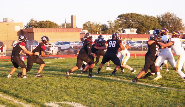It's mad blocks everywhere! Young (14) slips the ball to Hermosillo (28), while Reyes (4), Whitham (33), Juan Tapia (98), and Luna (7) clear his way to the goal line.