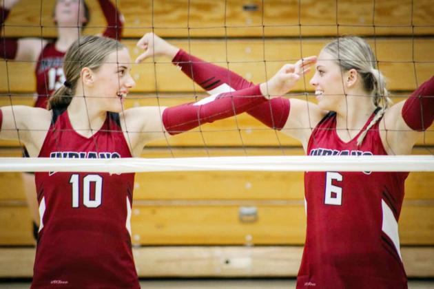 Kenzie Porter and Emma Berning participate in the Jamboree for the Lady Indians. Photo by Hallie Means