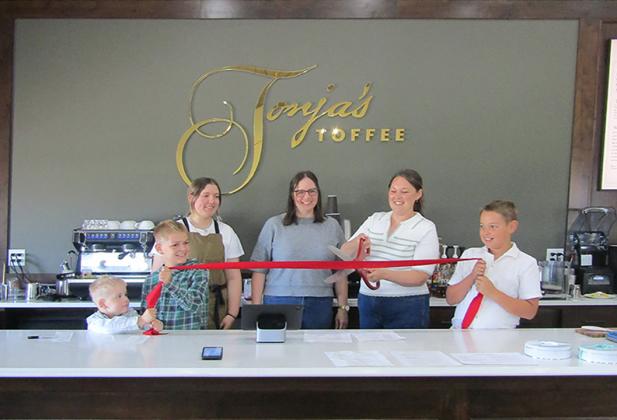 Above (L-R): Ledger Horton, Axel Horton, Hayden Horton, Maegan Berry, Aubrey Horton, Kaladin Horton are all smiles as Aubrey cuts the ribbon.