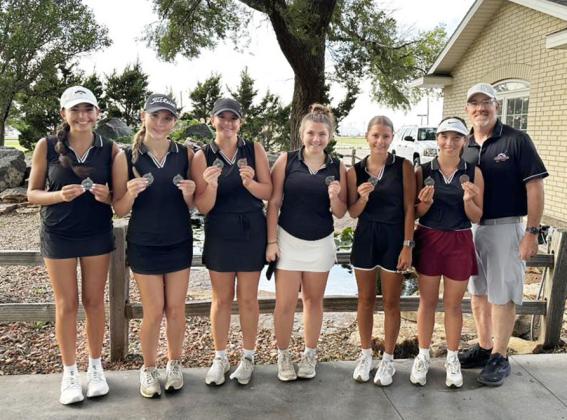 Hugoton - Sophia Wedel, Audrina Marcy, Katelyn Thurman, Kimberly Meyer, Evy Thurman, Jentri Porter, Coach Brown Photo by Janee Porter