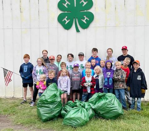 Members (and siblings) of the Lydia Jayhawker 4-H Club cleaned up trash at the fairgrounds and county park.
