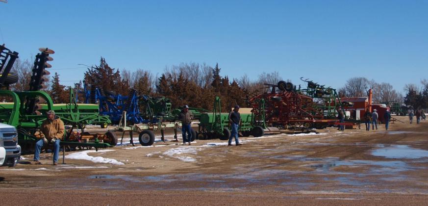 Despite Swampy Conditions Auction Draws Large Crowd