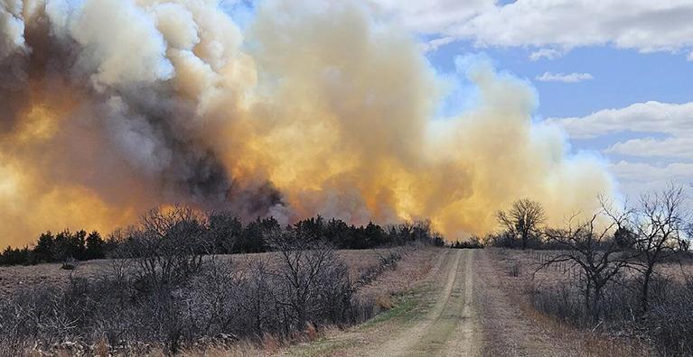 Right: Wildfires have forced evacuations near Ashland as firefighters work to contain Meade County fires that have burned nearly 93,000 acres. (Kansas Forest Service)