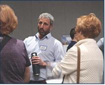Jesse Gronner speaks to locals on the details of the renewable energy and data center project. Calen Moore/Kansas News Service