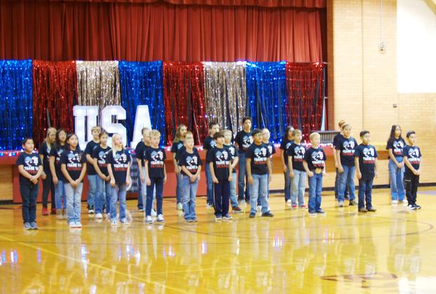 WCES students prepare to honor veterans with a performance at their Veterans Day program.
