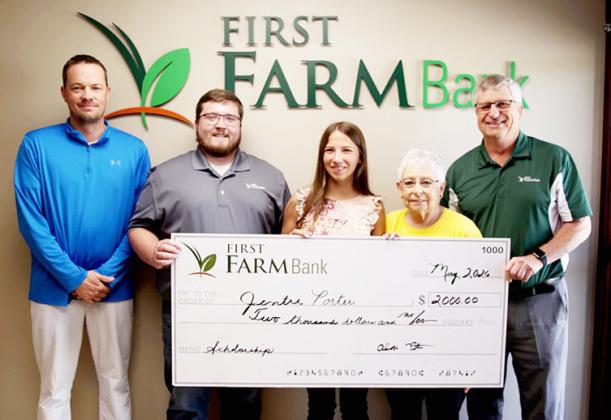 The Tribune First Farm Bank personnel (L-R): Trevor Carney, Hunter Means, Marlen Kuder, and Alan Peter flank WCHS 2026 graduate Jentri Porter. Photo Courtesy Christy Hopkins, The Greeley County Republican.