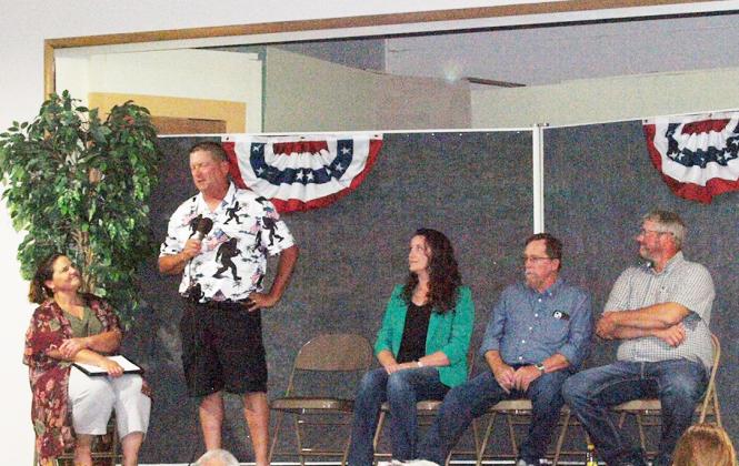 Despite the sweltering heat inside and outside, the audience of interested voters and fellow candidates, paid rapt attention as the candidates for local office answered questions put to them by event moderator, Christy Hopkins, editor and publisher of The Greeley County Republican.