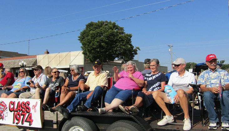 Another view of the Class of 1974 float. They had great participation for their 50th reunion. Jerad Gooch tosses bubble gum and suckers to the kids.