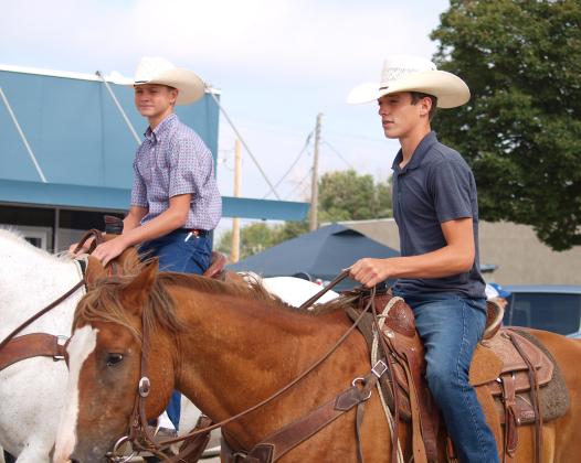Young cowboys keep the horse-riding tradition alive at the parade.