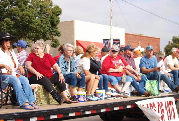 The Class of 1975 may have been the longest float in the parade. We sure couldn't get them all in one frame.