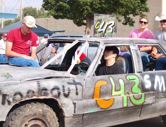 Above: I have no idea. C43. | Below: Price Repair participates in the parade.