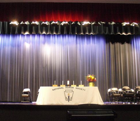 The stage is set to induct new members.